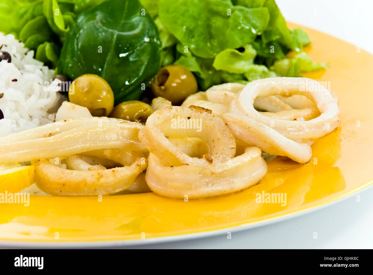 deep-fried squid rings with salad Stock Photo - Alamy