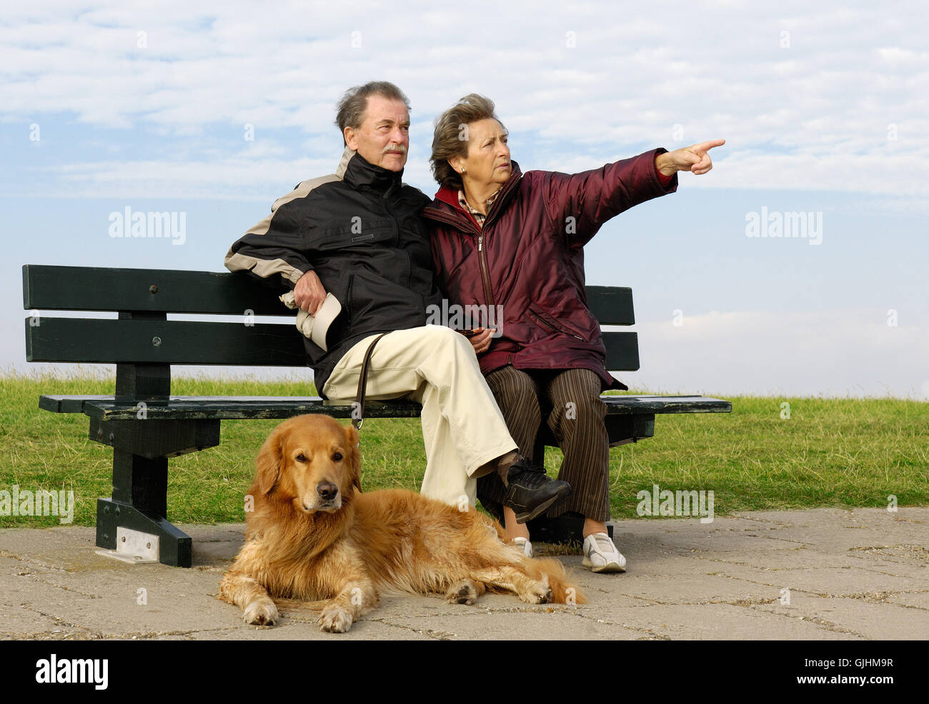 senior couple on a park bench Stock Photo - Alamy
