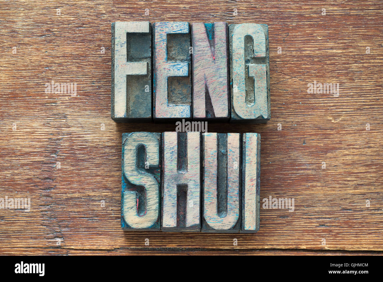 feng shui phrase made from wooden letterpress type on grunge wood Stock Photo