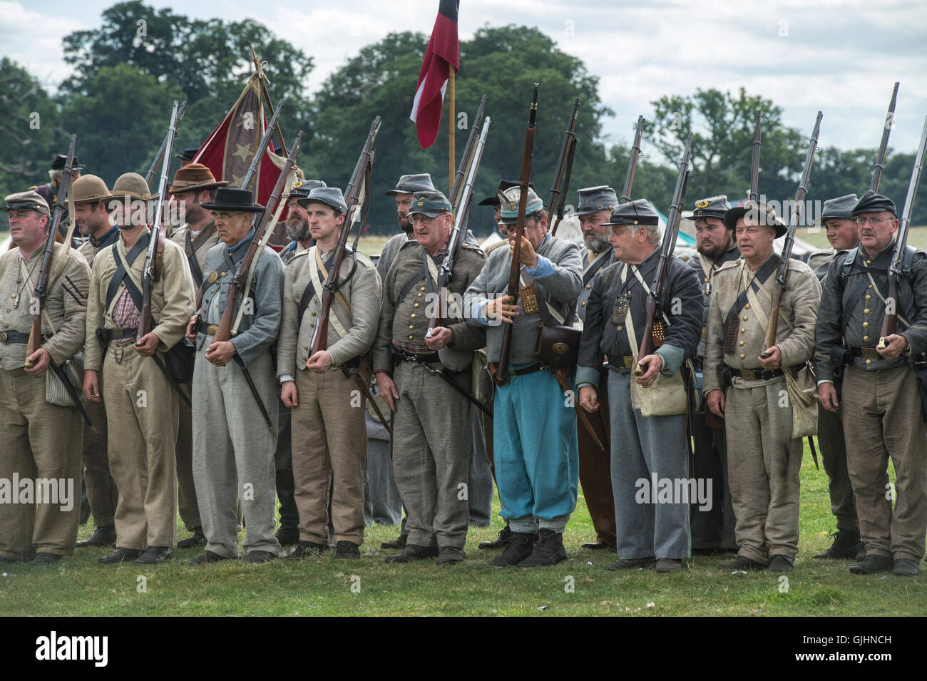 Confederate Soldiers on the battlefield of a American Civil war reenactment at Spetchley Park, Worcestershire, England Stock Photo
