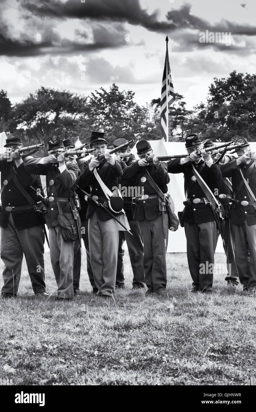 Union Soldiers on the battlefield of a American Civil war reenactment at Spetchley Park, Worcestershire, England. Black and White Stock Photo