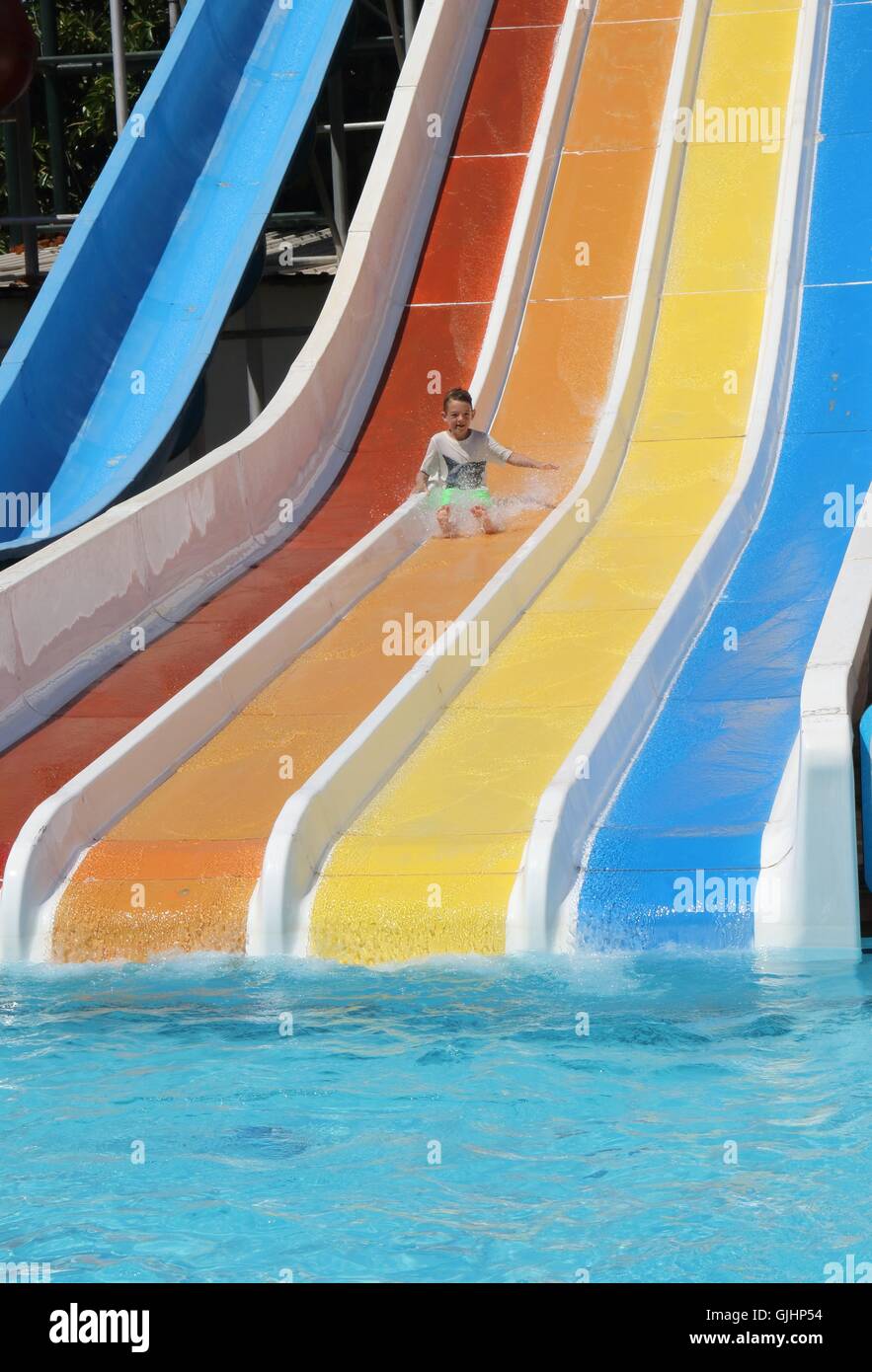 https://c8.alamy.com/comp/GJHP54/a-young-english-boy-having-fun-on-a-water-slide-in-a-waterpark-while-GJHP54.jpg