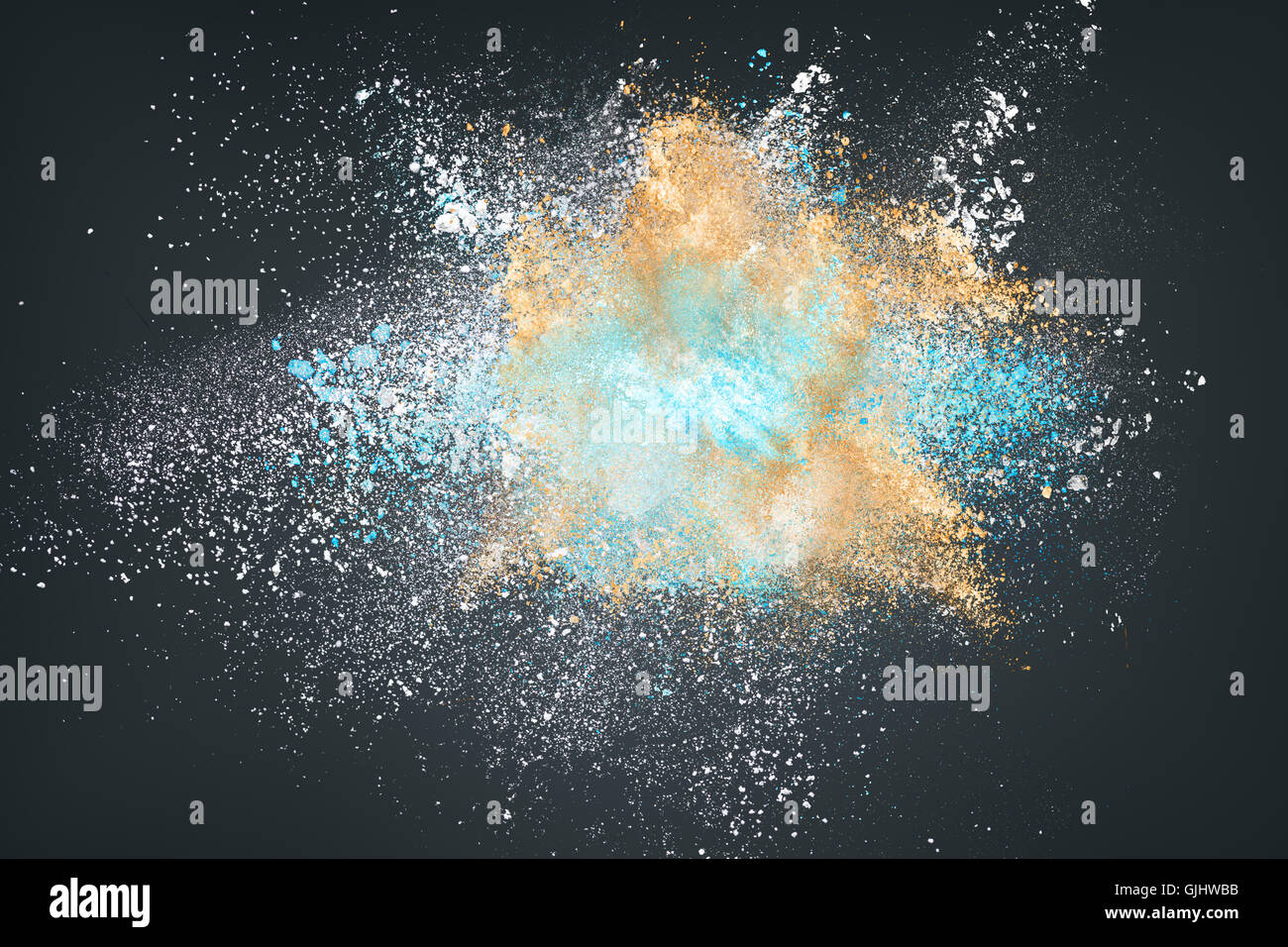 Abstract design of powder cloud texture explode over dark background Stock Photo