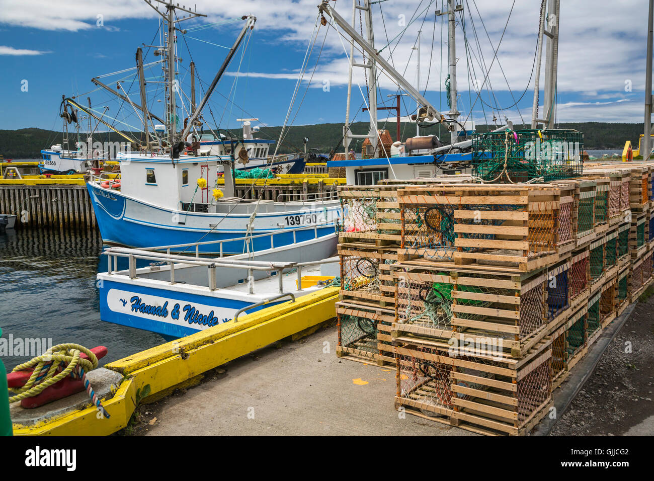 Fishing boats and lobster traps near Bay Roberts, Newfoundland and Labrador, Canada. Stock Photo