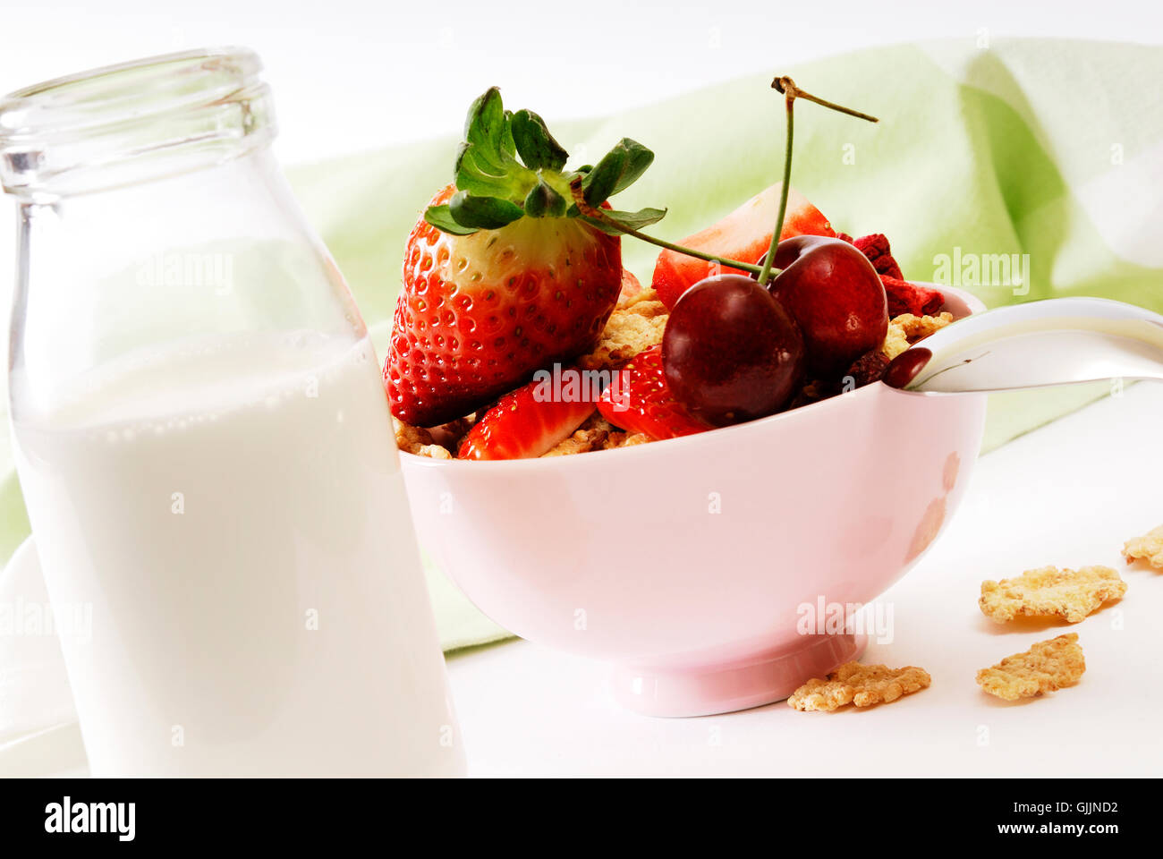 milk bowl strawberries Stock Photo