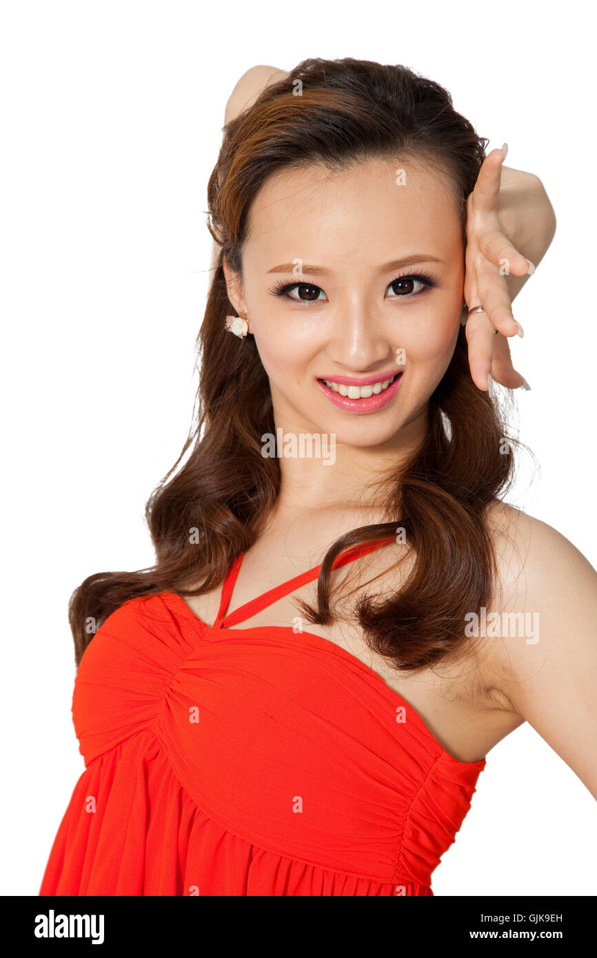 Studio shot young woman dancing Stock Photo - Alamy