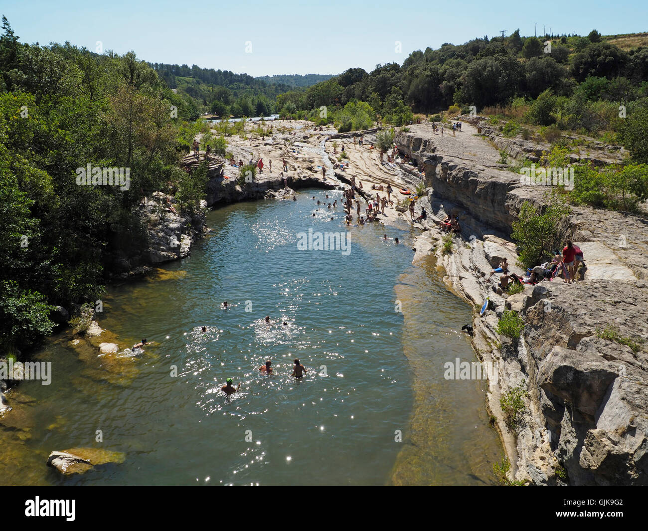 People swimming in the l'Orbieu river at Ribaute, near Lagrasse, southern France Stock Photo