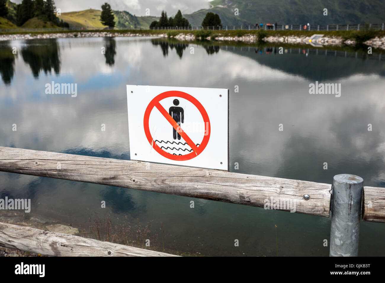 No Swimming Sign at a lake in top of Penken, Zillertal Stock Photo