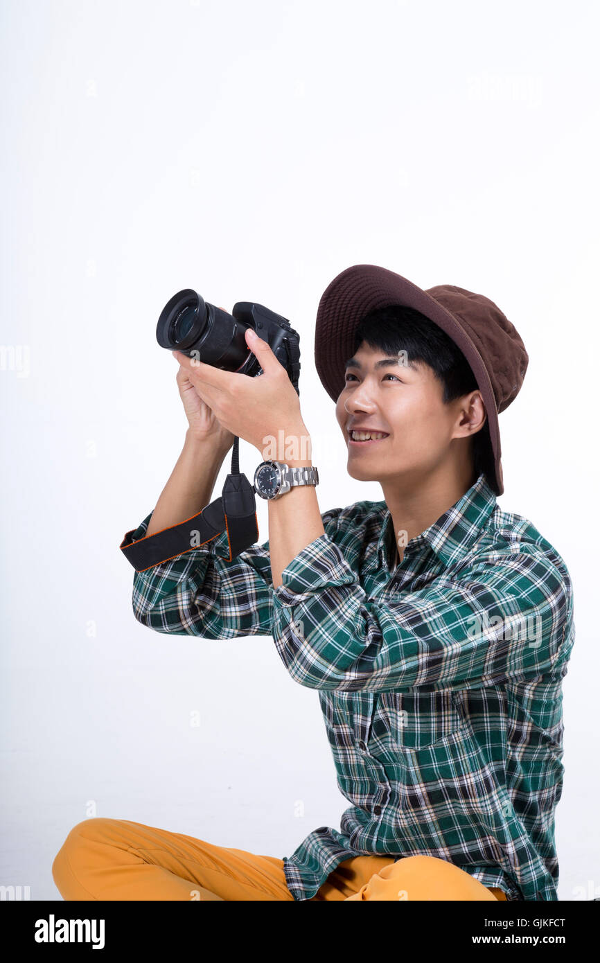 Studio shot of young man Stock Photo - Alamy