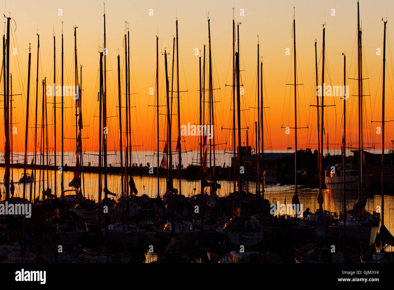 sunset sail yacht Stock Photo