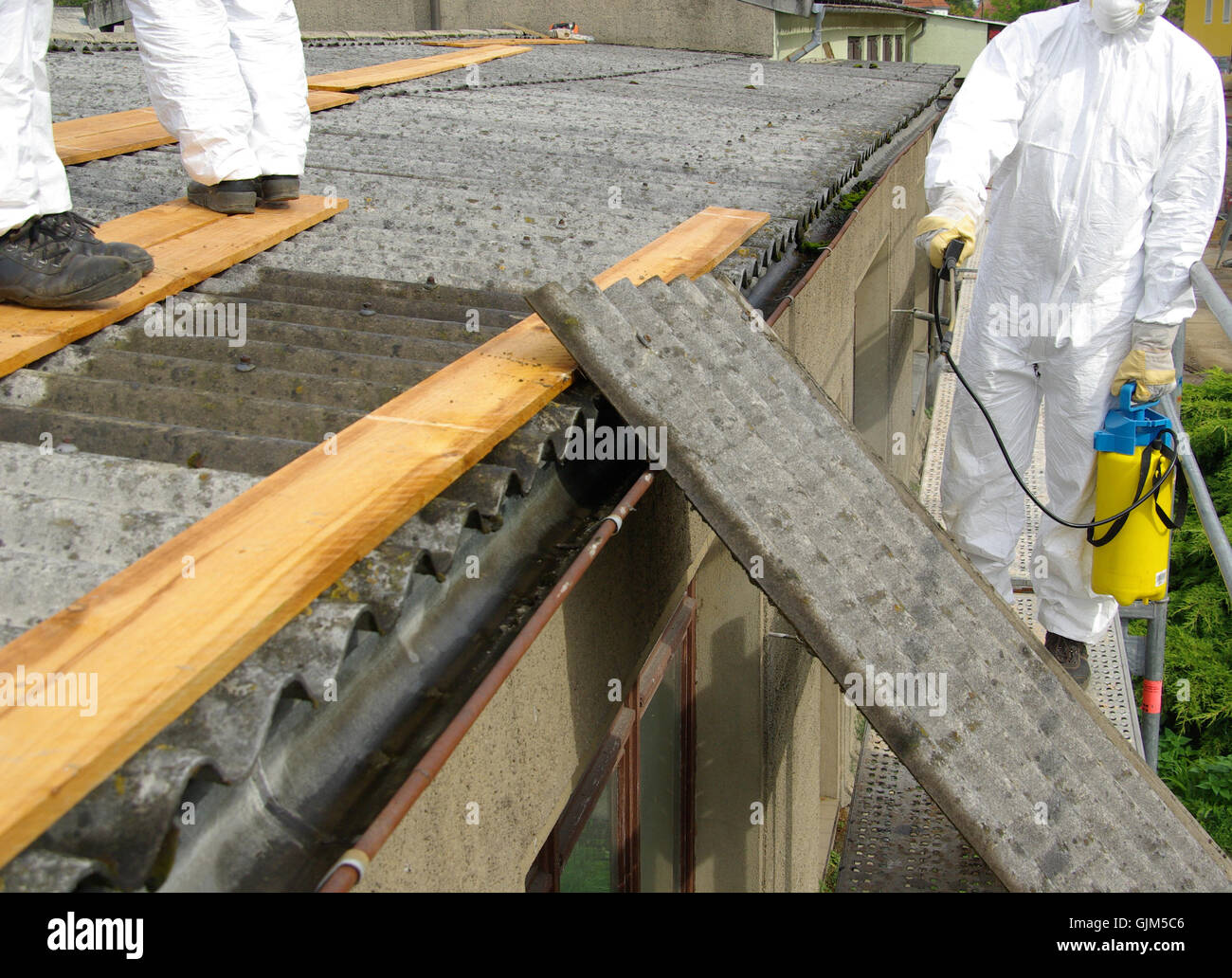 demolition scrapping asbestos Stock Photo