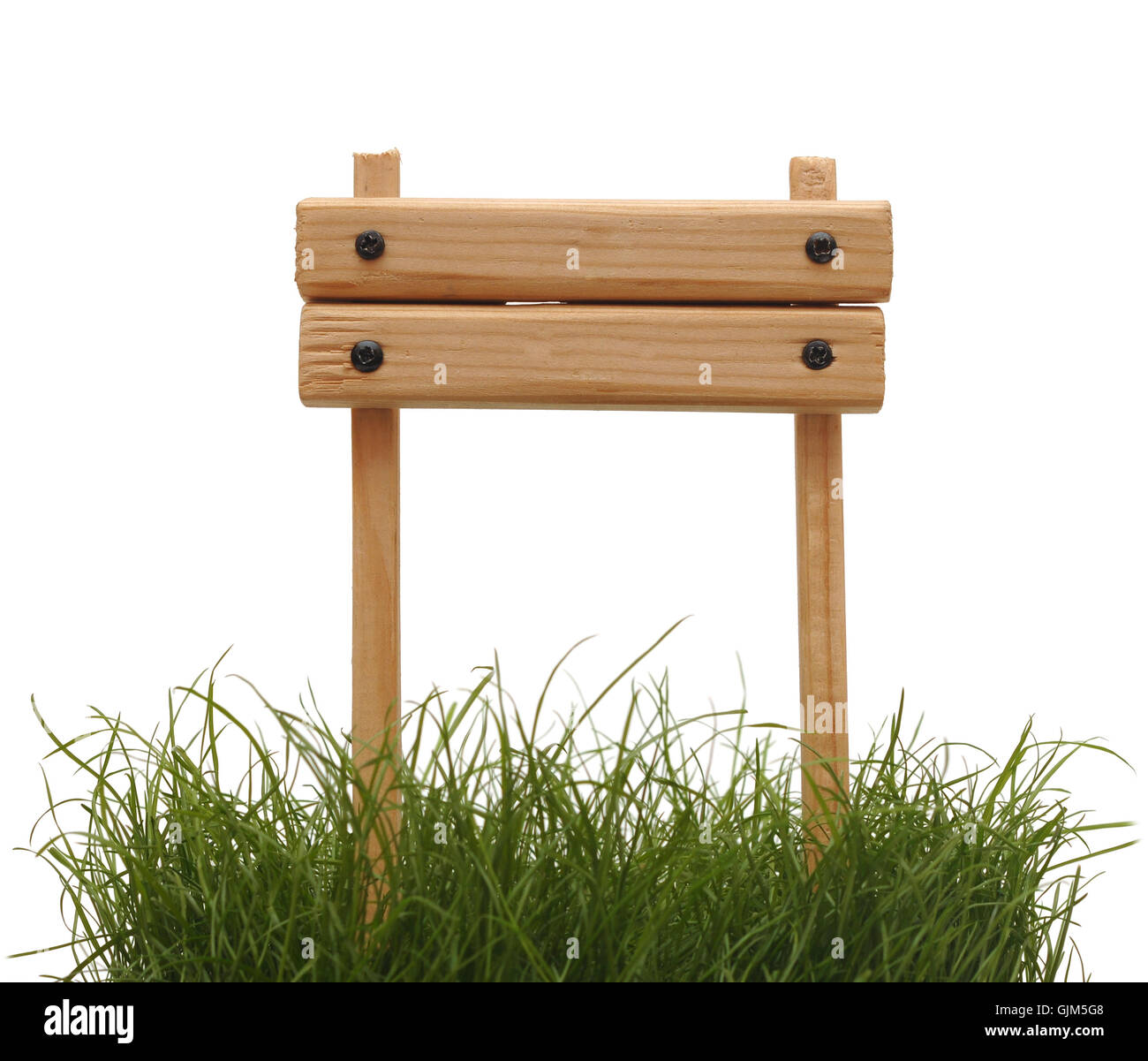 wood sign with grass isolated on a white background Stock Photo - Alamy