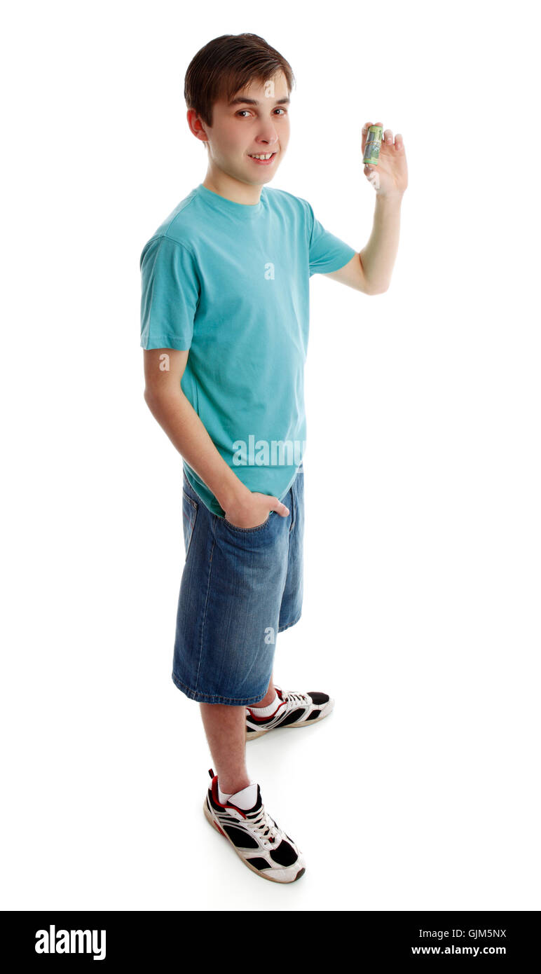 Teen boy holding money Stock Photo