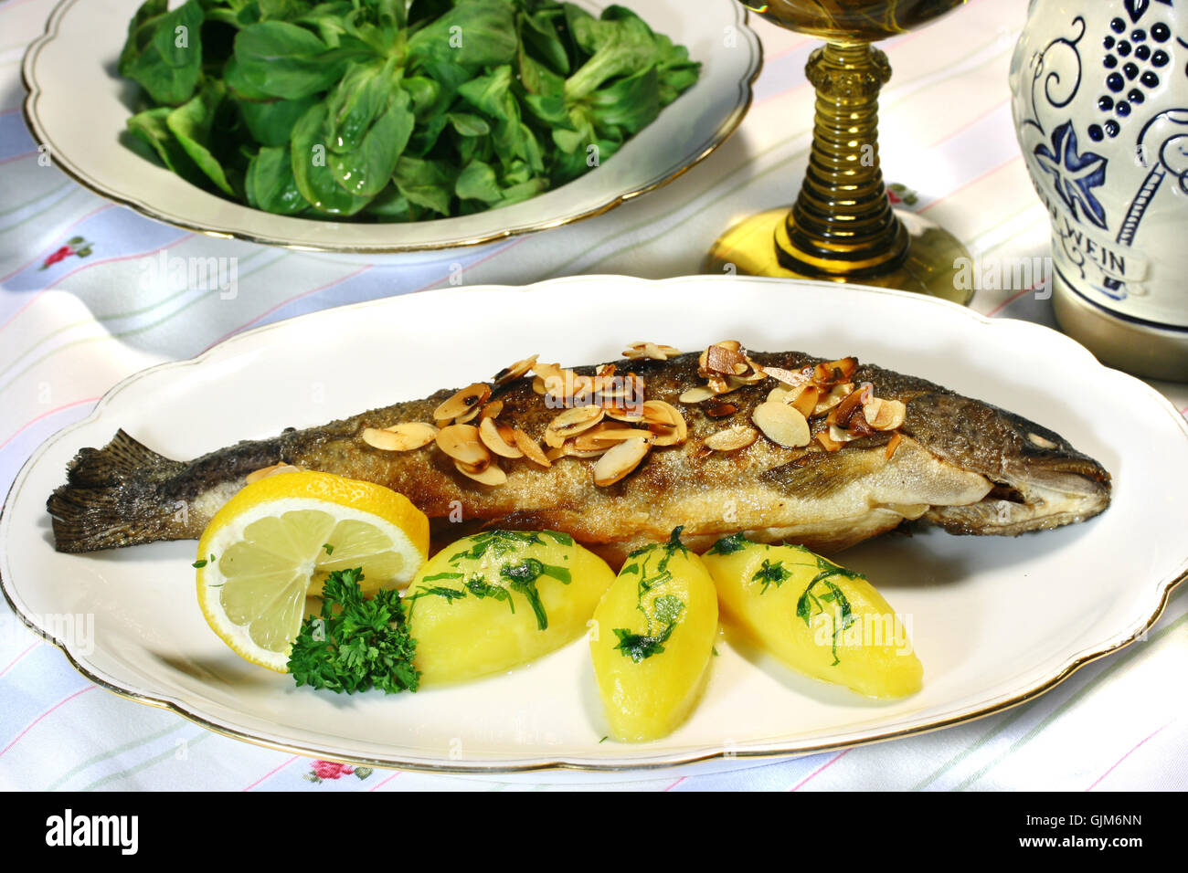 trout meuni¨re with corn salad Stock Photo