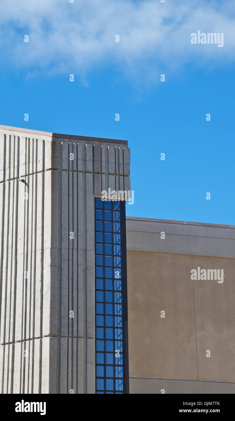 Blue window concrete building Stock Photo - Alamy