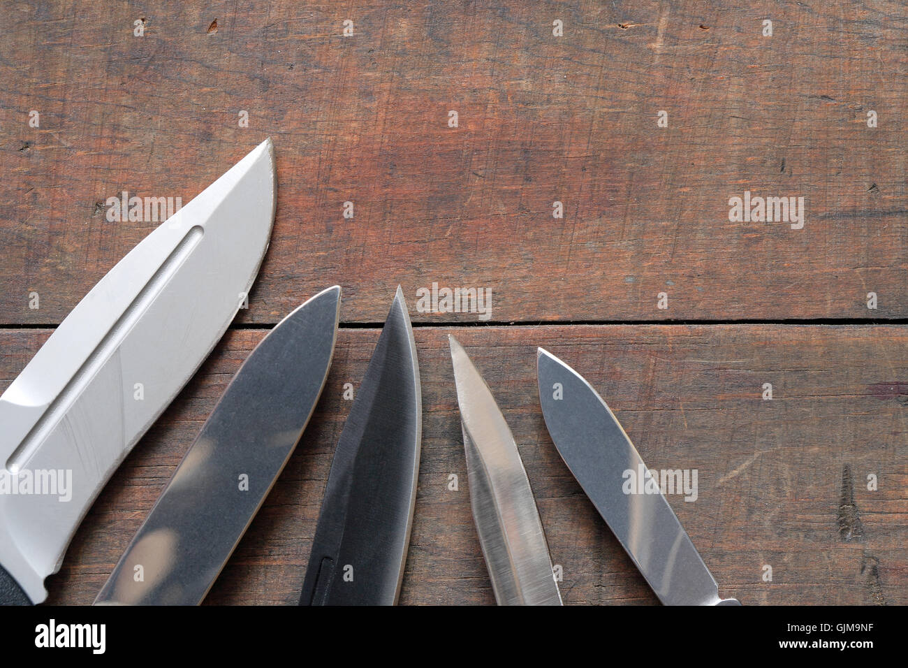 Knives On Wood Stock Photo