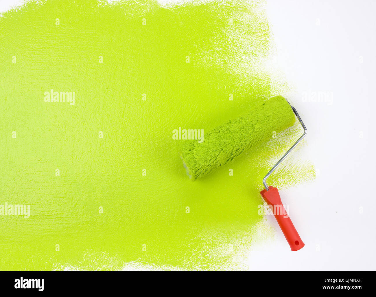 green painting roller Stock Photo - Alamy