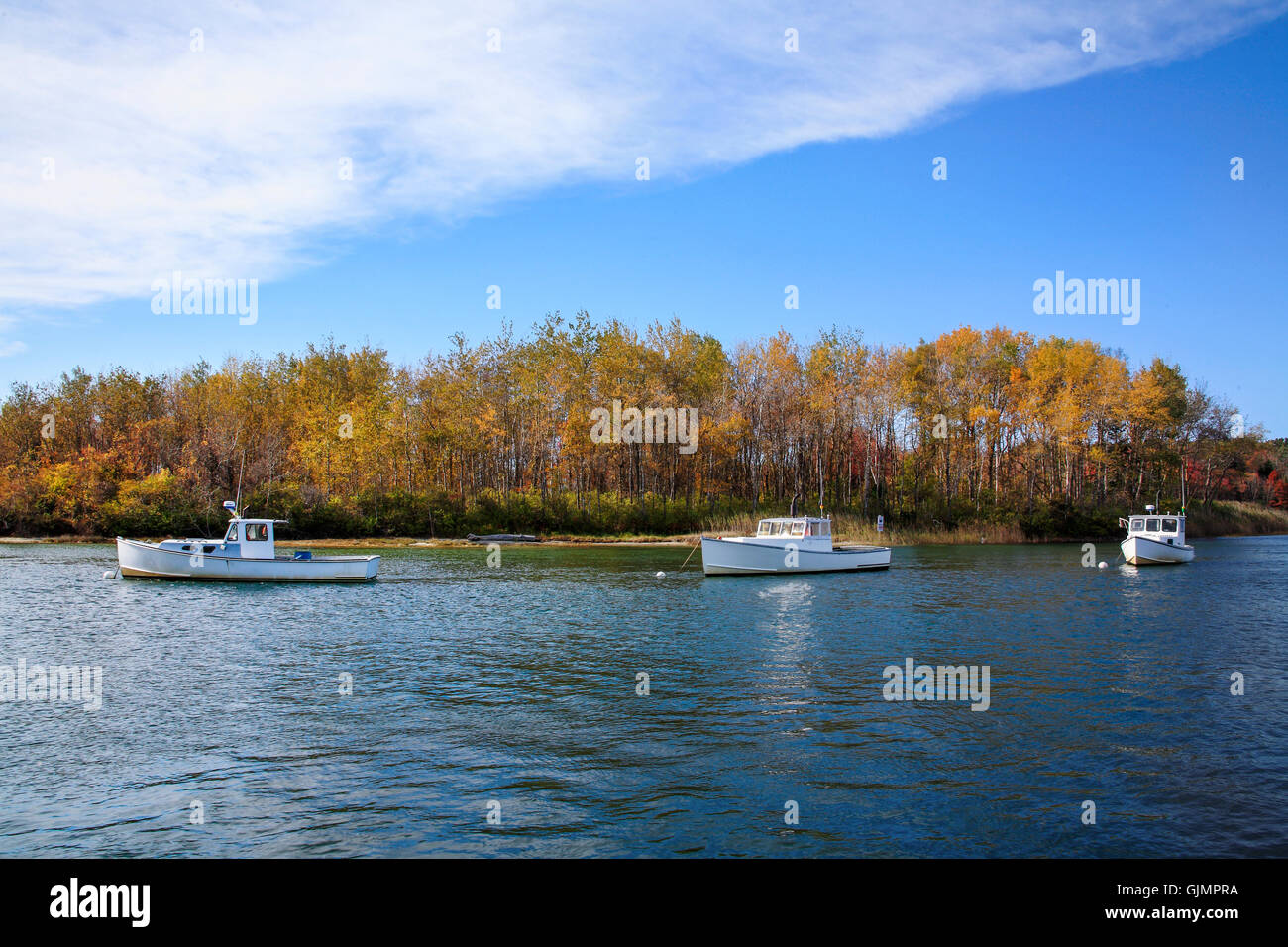 Lobster boats at rest on a sunny autumn morning in Kennebunkport Harbor, Kennebunkport, Maine, USA Stock Photo