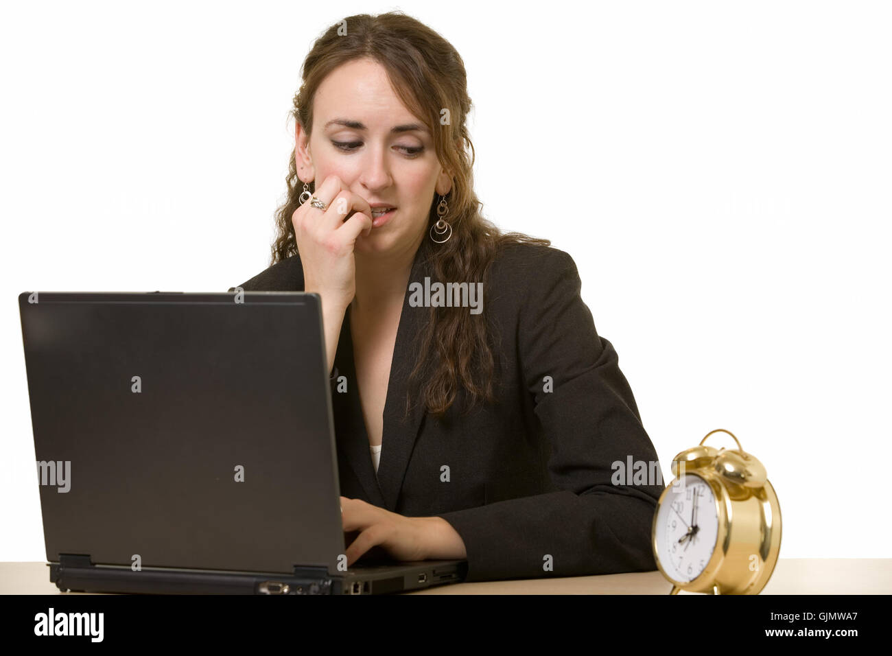 Lady Biting Computer Frustrated woman biting her laptop hi-res stock photography and images ...