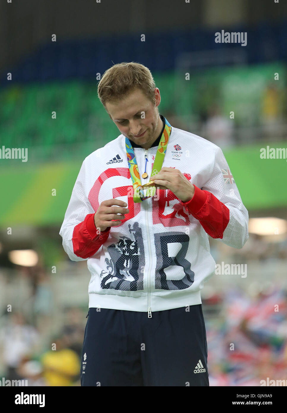 Great Britain's Jason Kenny on the podium after winning the gold medal in the Men's Keirin Final at the Rio Olympic Velodrome on the eleventh day of the Rio Olympics Games, Brazil. Picture date: Tuesday August 16, 2016. Photo credit should read: David Davies/PA Wire. Stock Photo