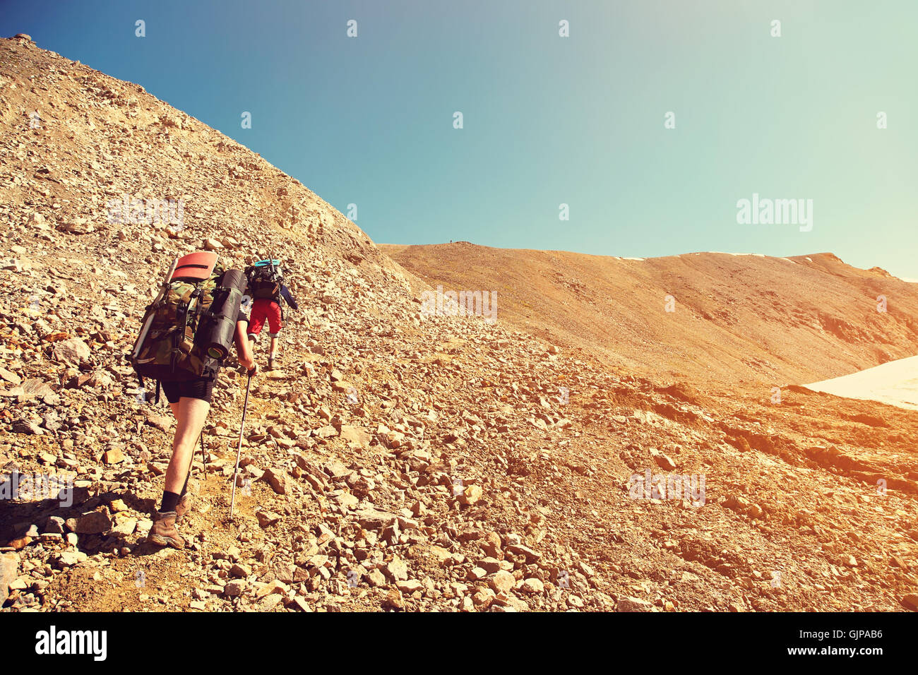 Group of hikers in the mountain Stock Photo - Alamy