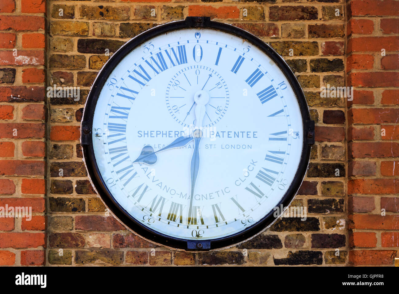 The Shepherd Gate Clock, an electric clock showing Greenwich Mean Time outside Royal Greenwich Observatory, London Stock Photo