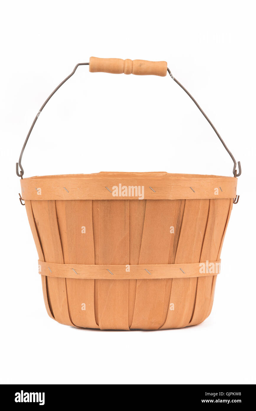 Wooden basket or bucket with handle on white Stock Photo