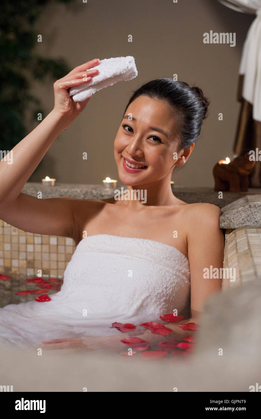 Young woman bathing Stock Photo - Alamy
