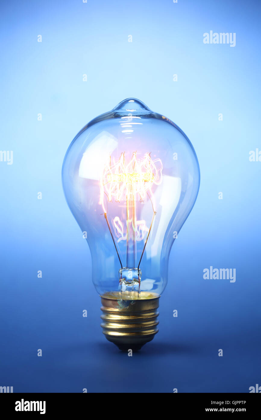 Glowing vintage light bulb Stock Photo