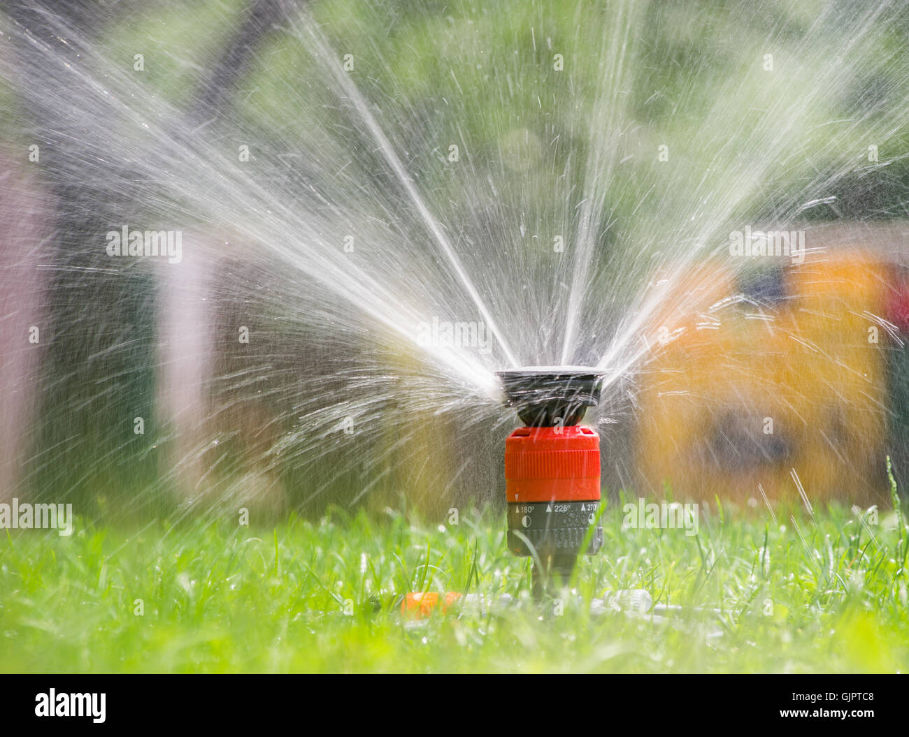 Spraying irrigation sprinkler head hi res stock photography and images