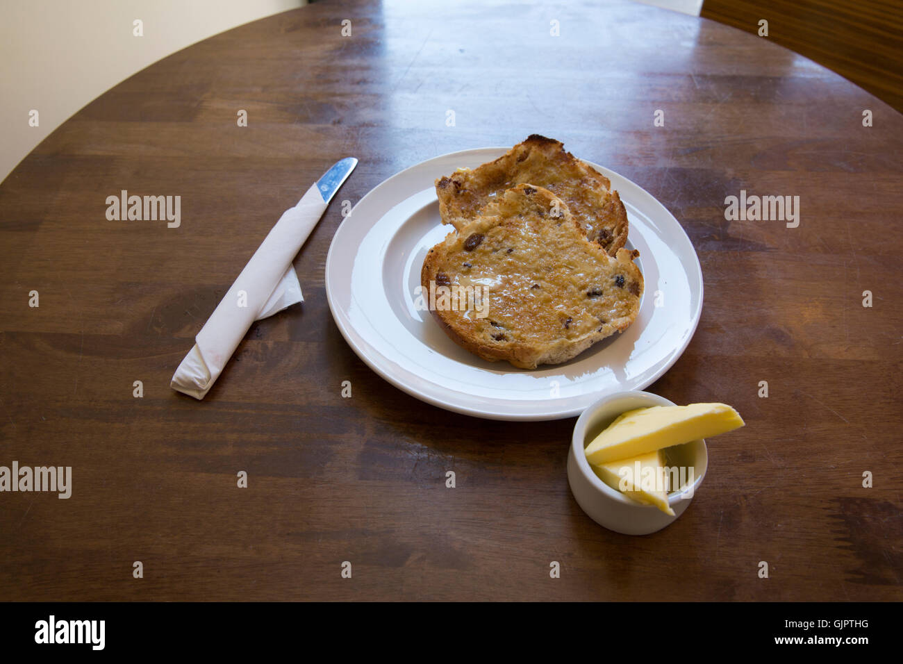 Warm Toasted Tea Cake with butter Stock Photo