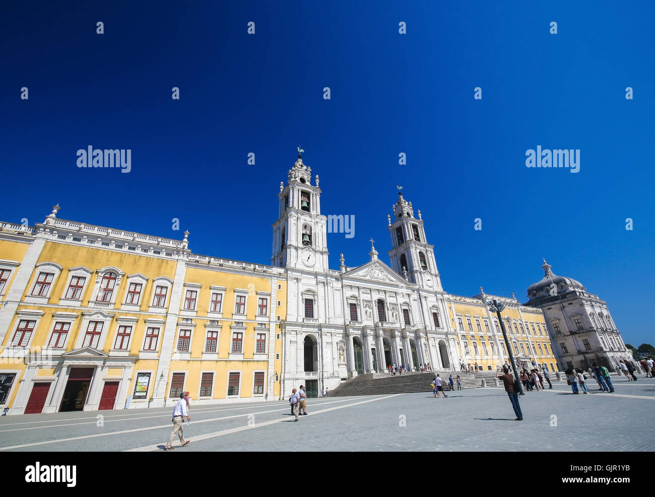 MAFRA, PORTUGAL - JULY 17, 2016: Facade of the Basilica at the Palace of Mafra, Portugal, a famous royal palace built in the 18t Stock Photo