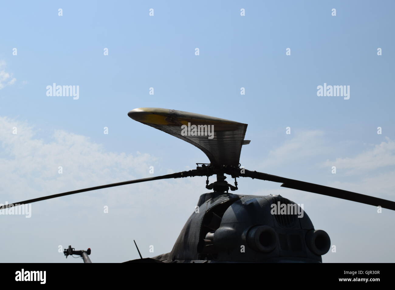 Old helicopter spraying fields. Helicopter spraying fertilizer Stock