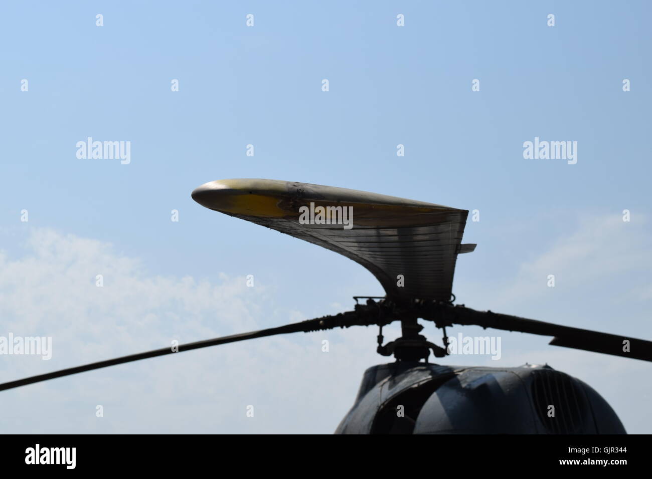 Old helicopter spraying fields. Helicopter spraying fertilizer Stock