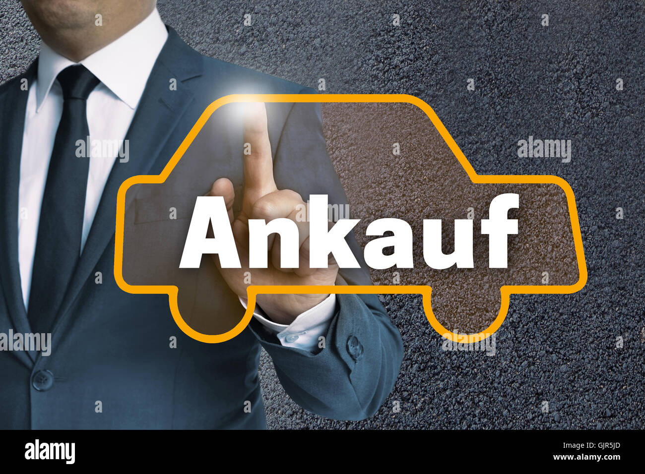 ankauf (in german purchase) auto touchscreen is operated by businessman concept. Stock Photo