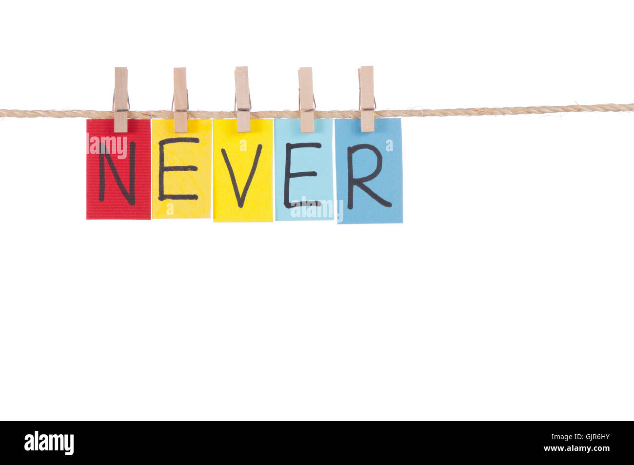 Never, Wooden peg and colorful words Stock Photo Alamy