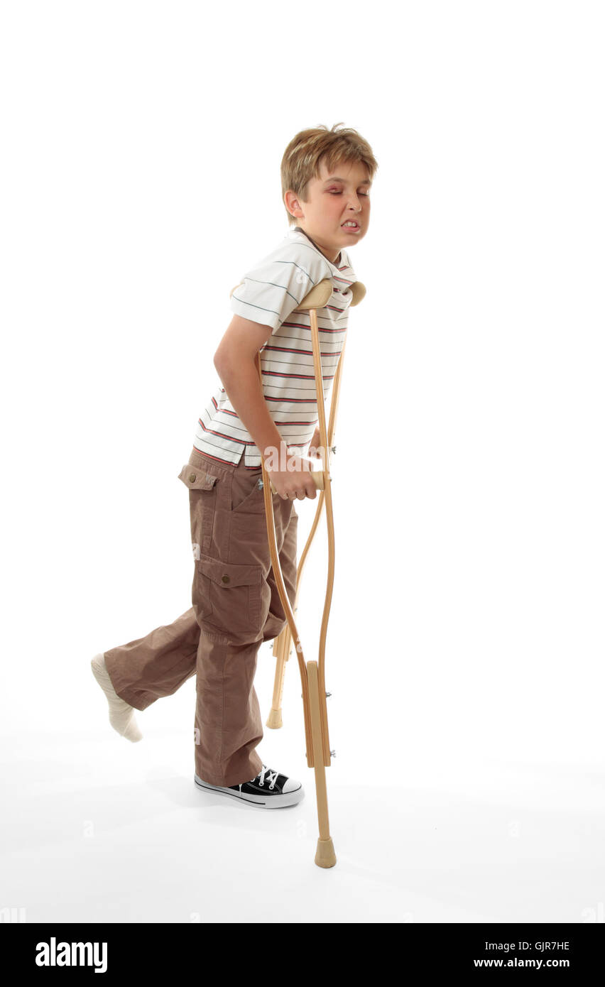 Boy with crutches hires stock photography and images Alamy