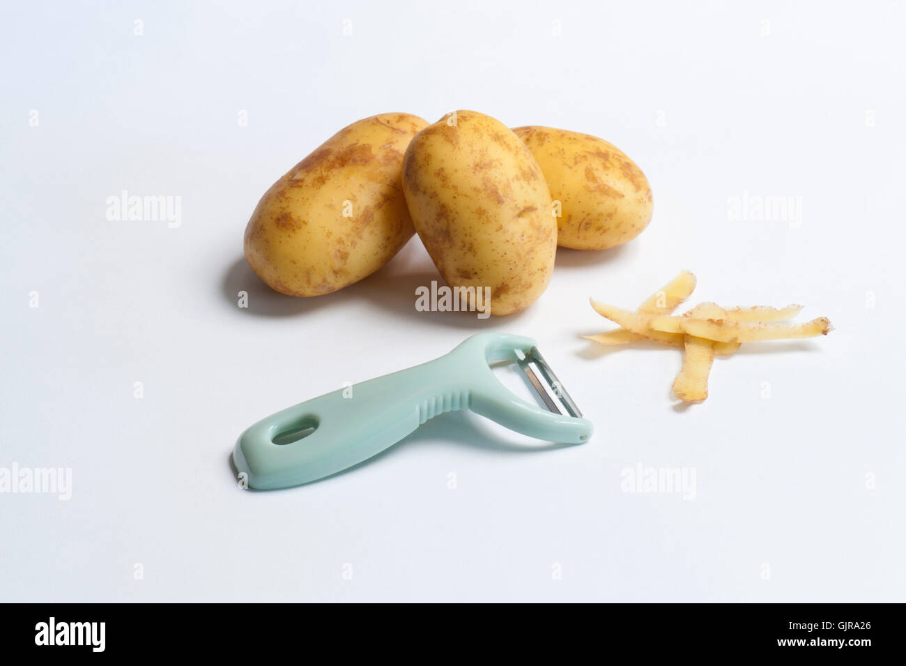 An Electric Potato Peeler On A White Surface Photograph by Jalag