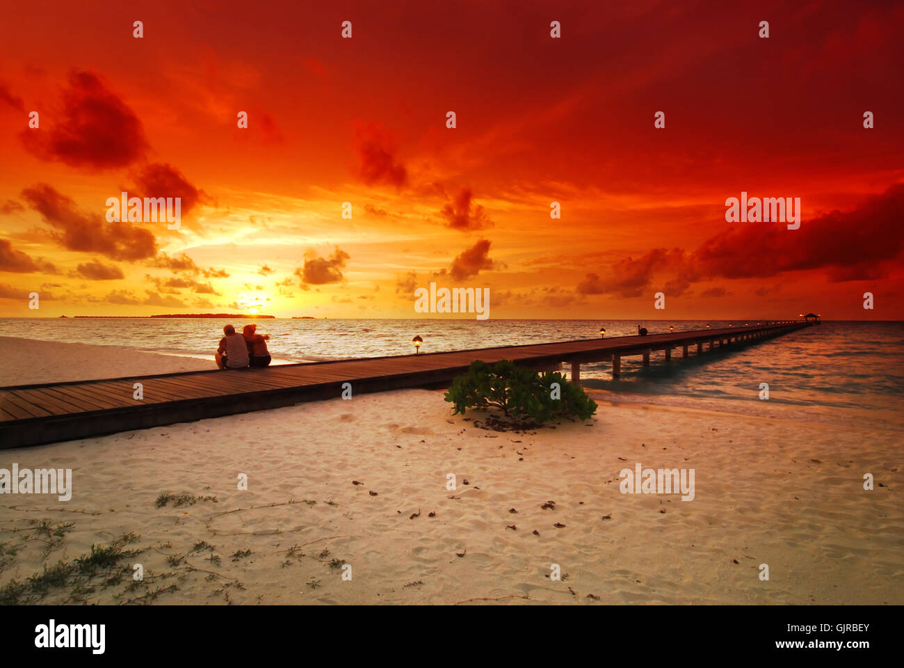 sunset romantic beach Stock Photo Alamy