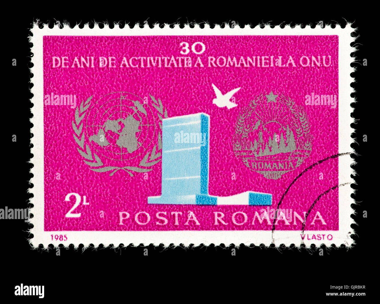 Postage stamp from Romania depicting the United Nations headquarters building in New York City, 30'th anniversary of the UN. Stock Photo