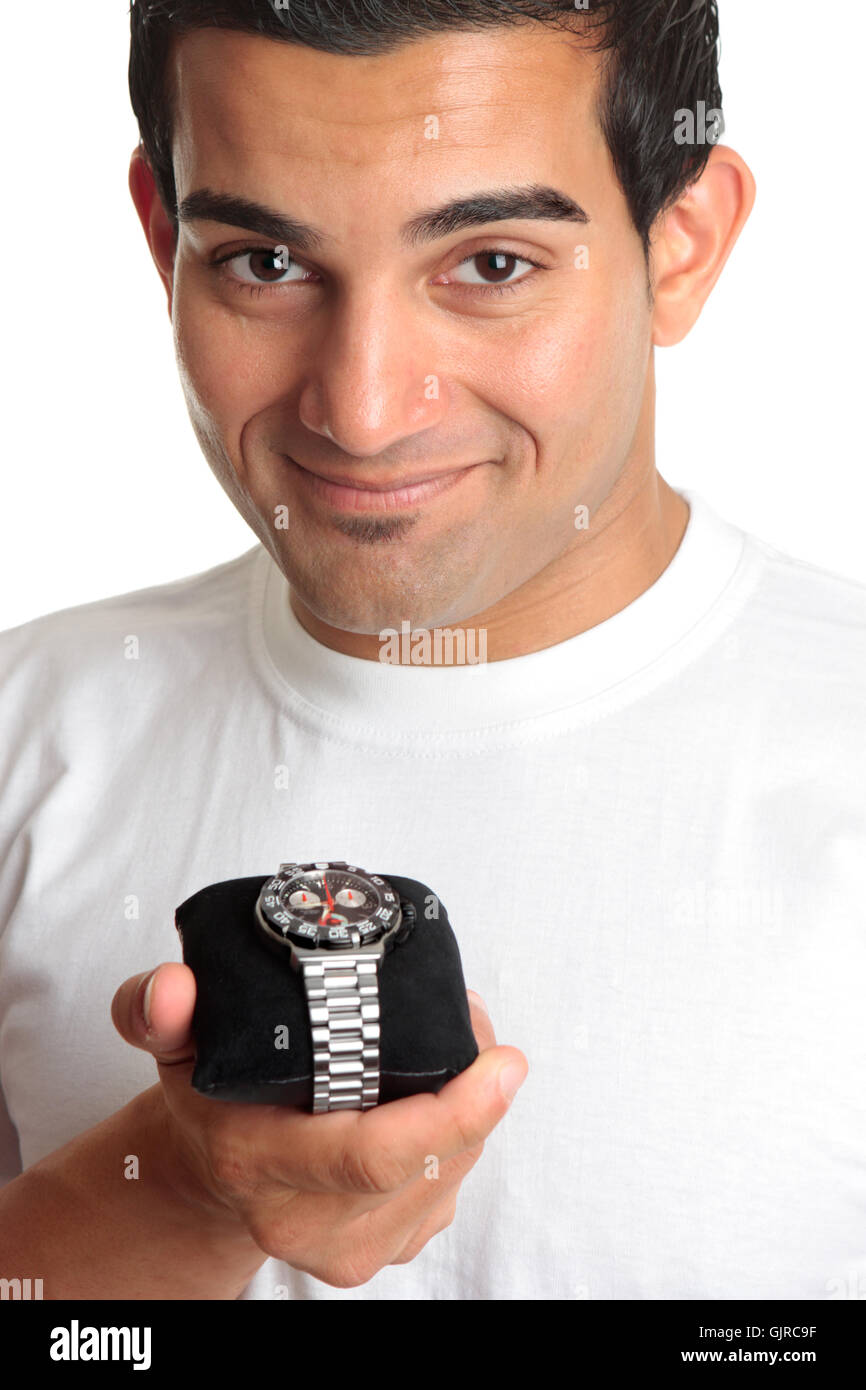 Man holding a chronograph wrist watch Stock Photo Alamy