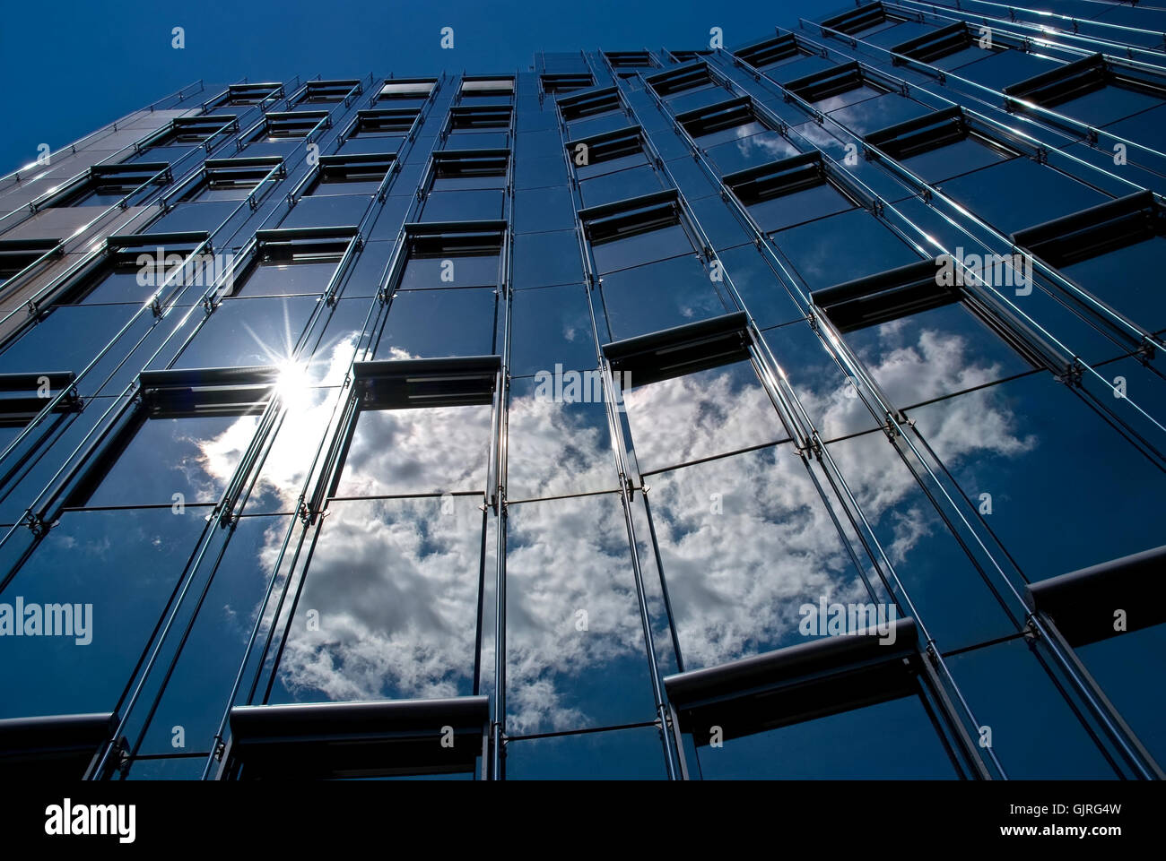 windows with clouds and sun image Stock Photo