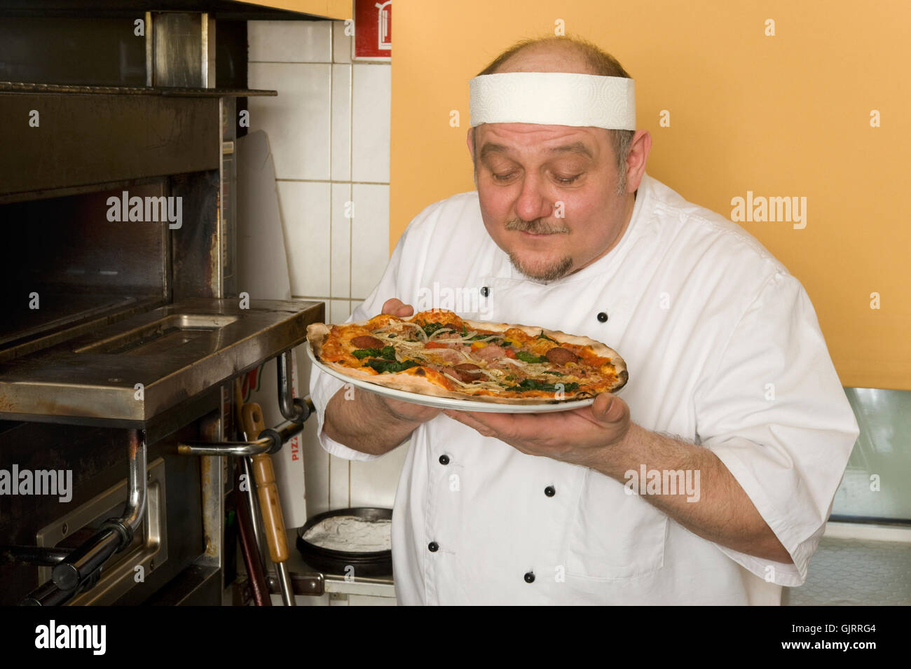 pizza maker Stock Photo