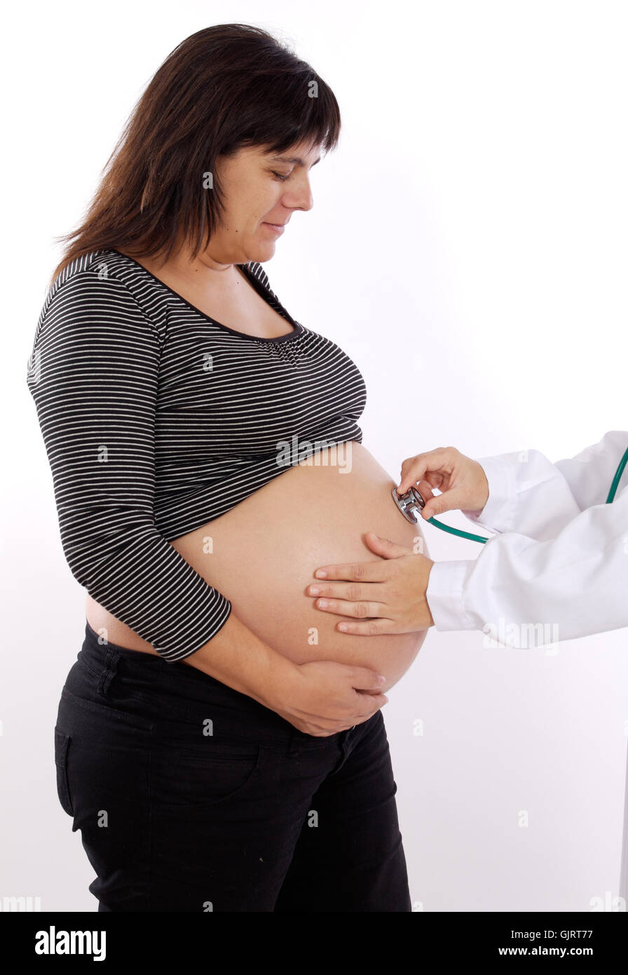 Black woman examined by doctor hi-res stock photography and images - Alamy