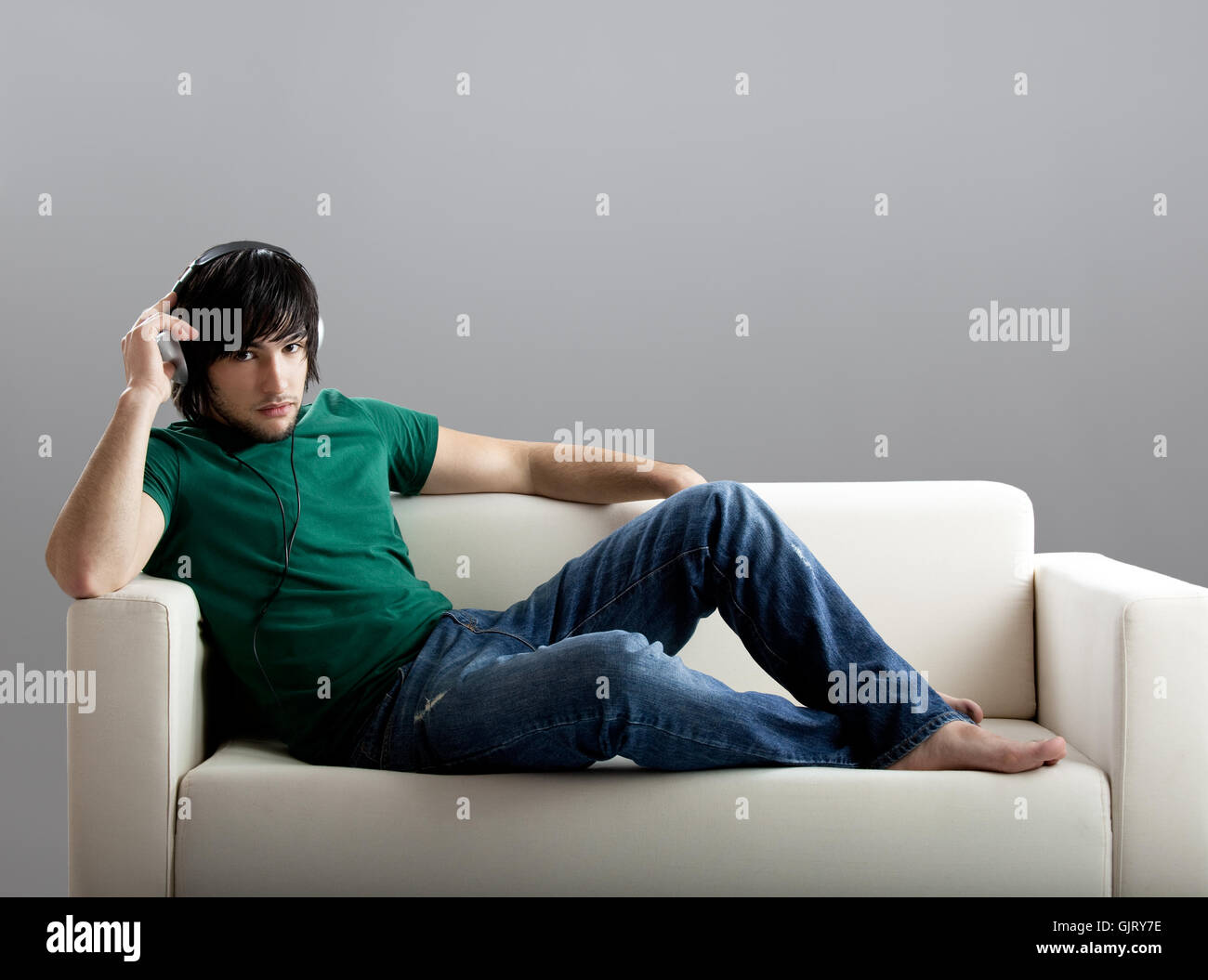 listen music sofa Stock Photo Alamy