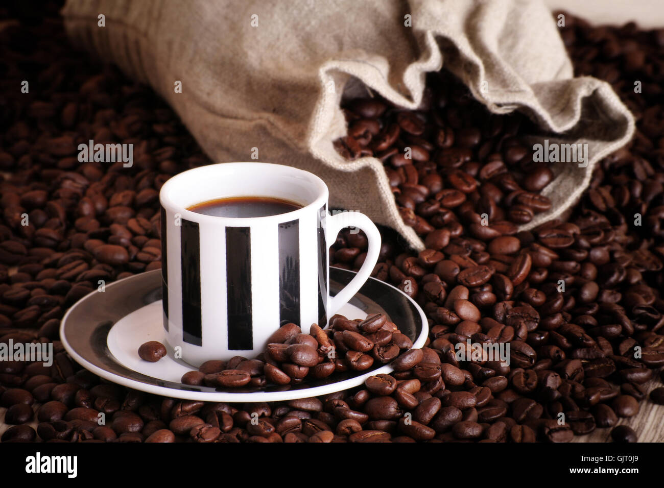 coffee cup with coffee beans Stock Photo