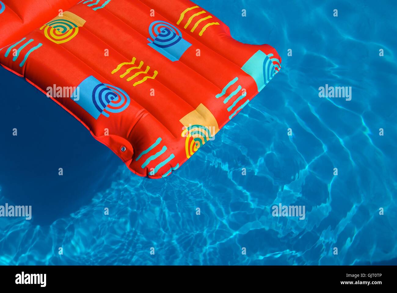 air mattress in pool Stock Photo Alamy