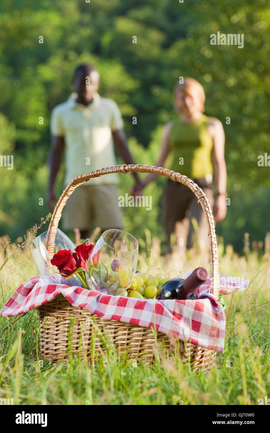 Woman younger man holding hands hi-res stock photography and images - Alamy