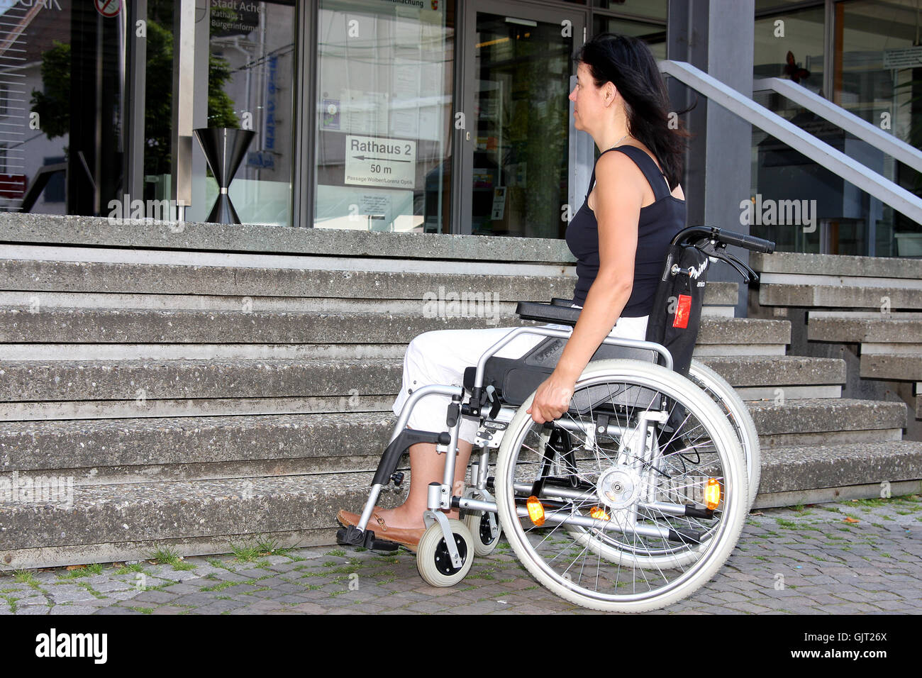 Woman in wheelchair hi-res stock photography and images - Alamy