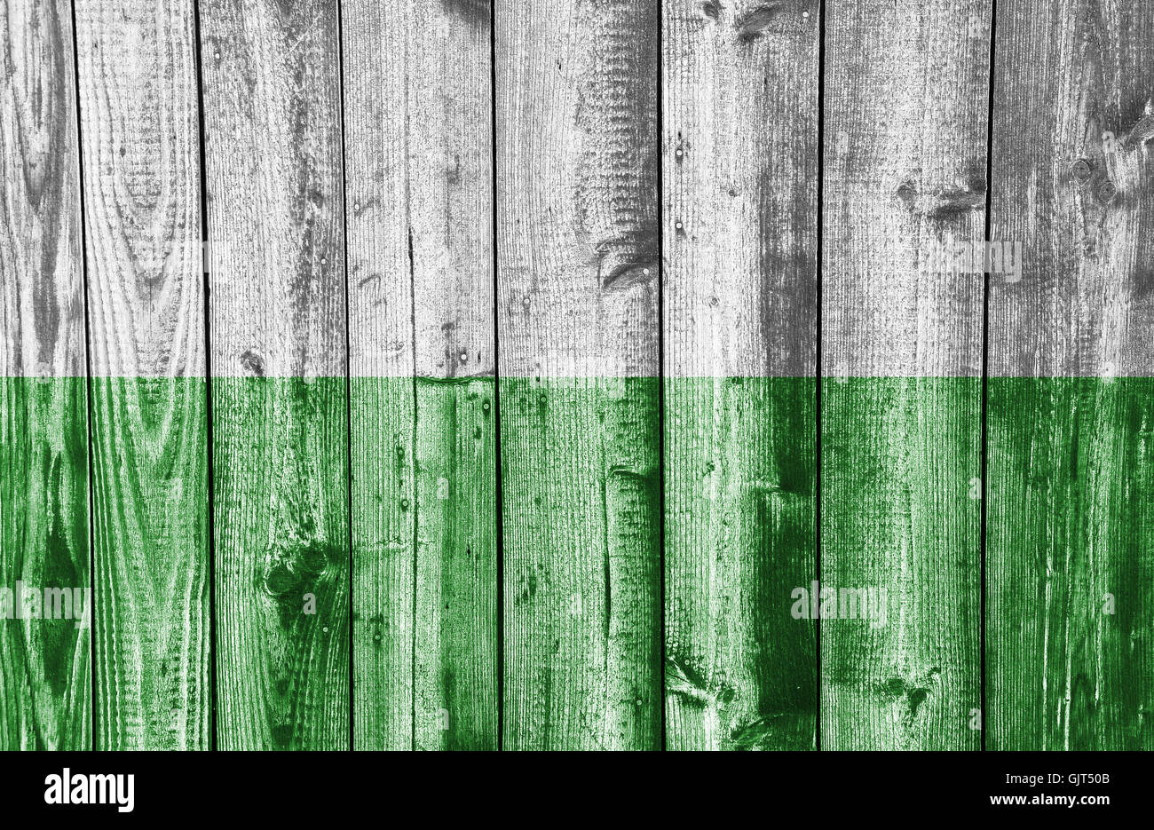 Flag on weathered wood Stock Photo - Alamy
